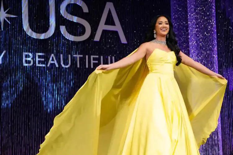 yellow pageant dress by Jovani. mobile image.